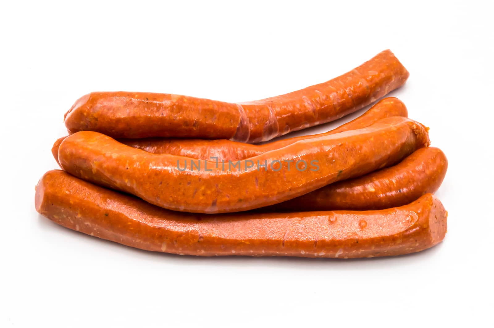 Raw Merguez on a white background by Philou1000