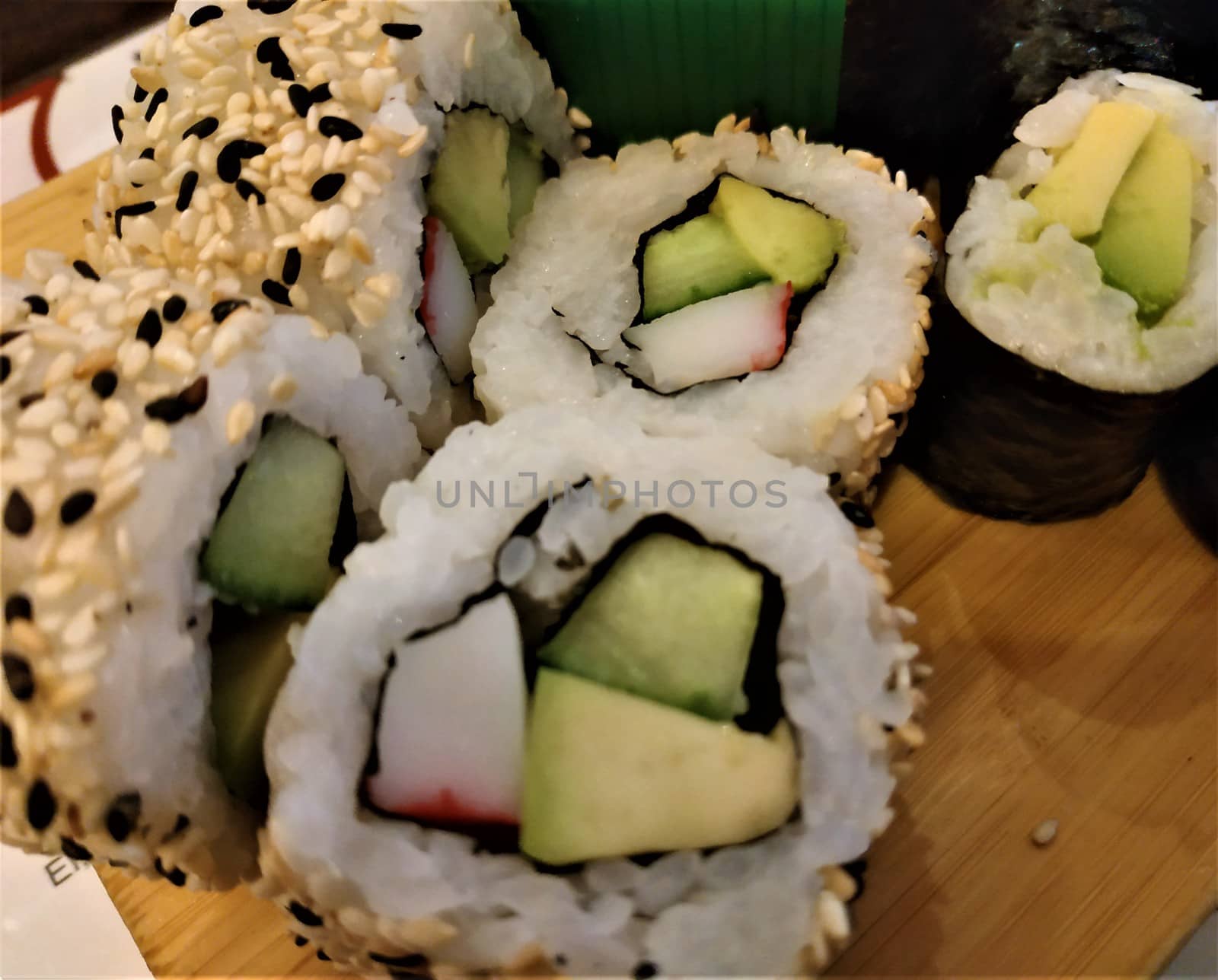 Different kinds of Maki Sushi with seaweed an sesame