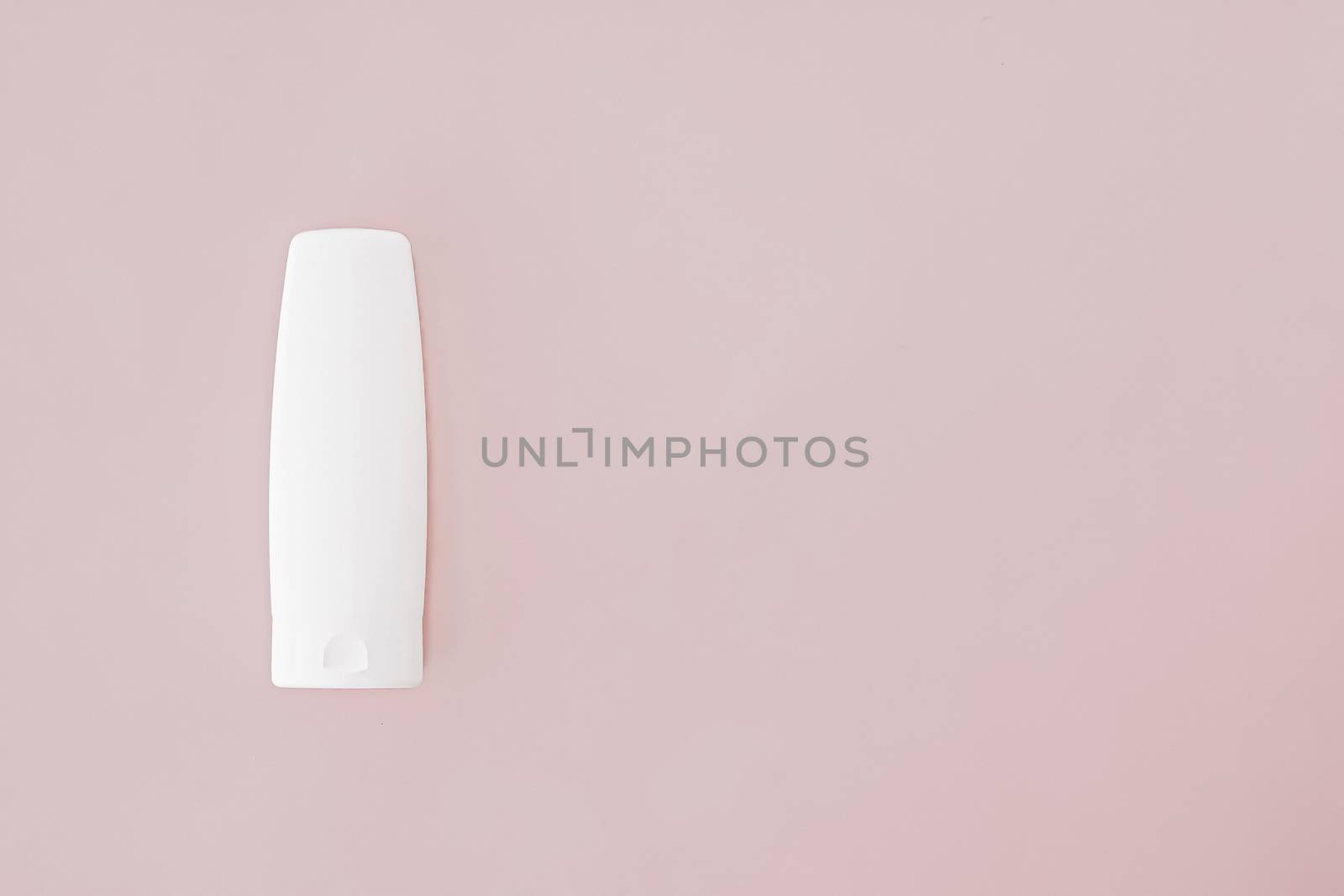 Moisturizing hand cream or body lotion on pink background, beauty product and skin care cosmetics, flatlay