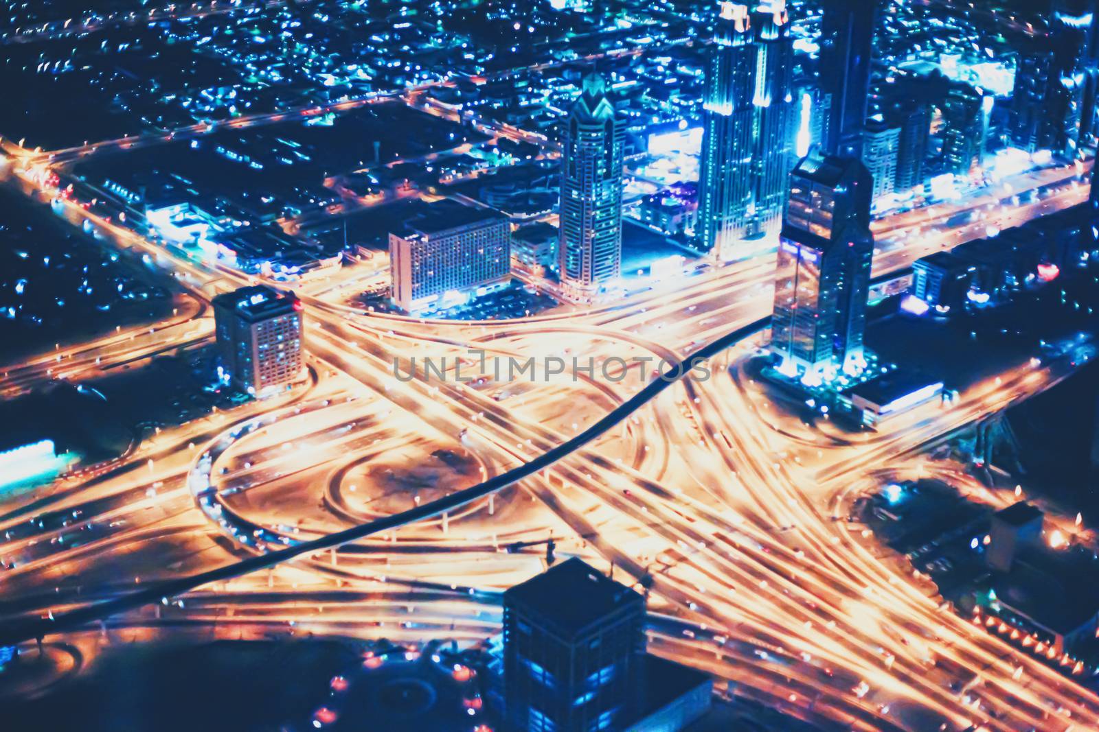 Aerial night view of Dubai in United Arab Emirates, metropolitan cityscape by Anneleven