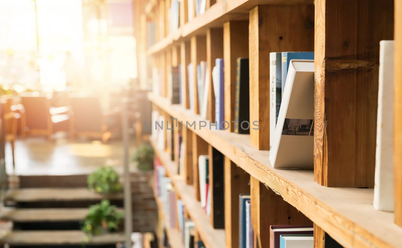 bookshelf in the coffee shop library corner. Education concept