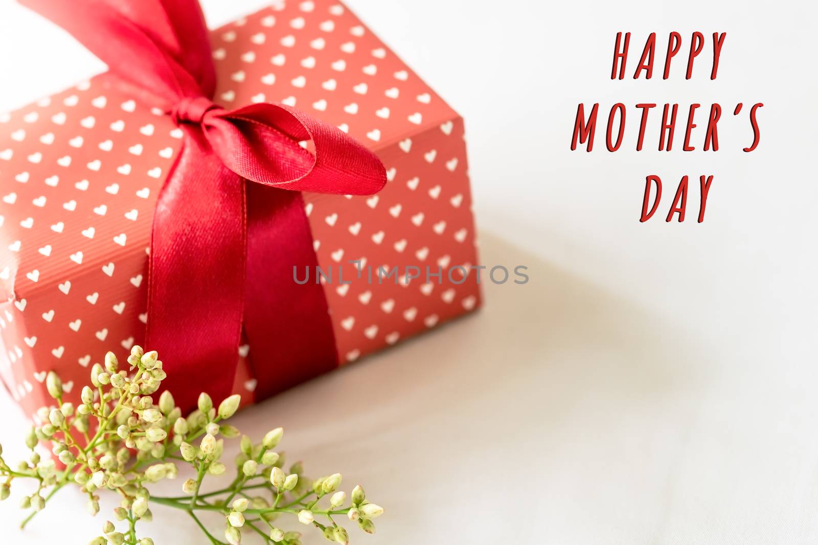 Happy mother's day concept. Gift box and flower by psodaz