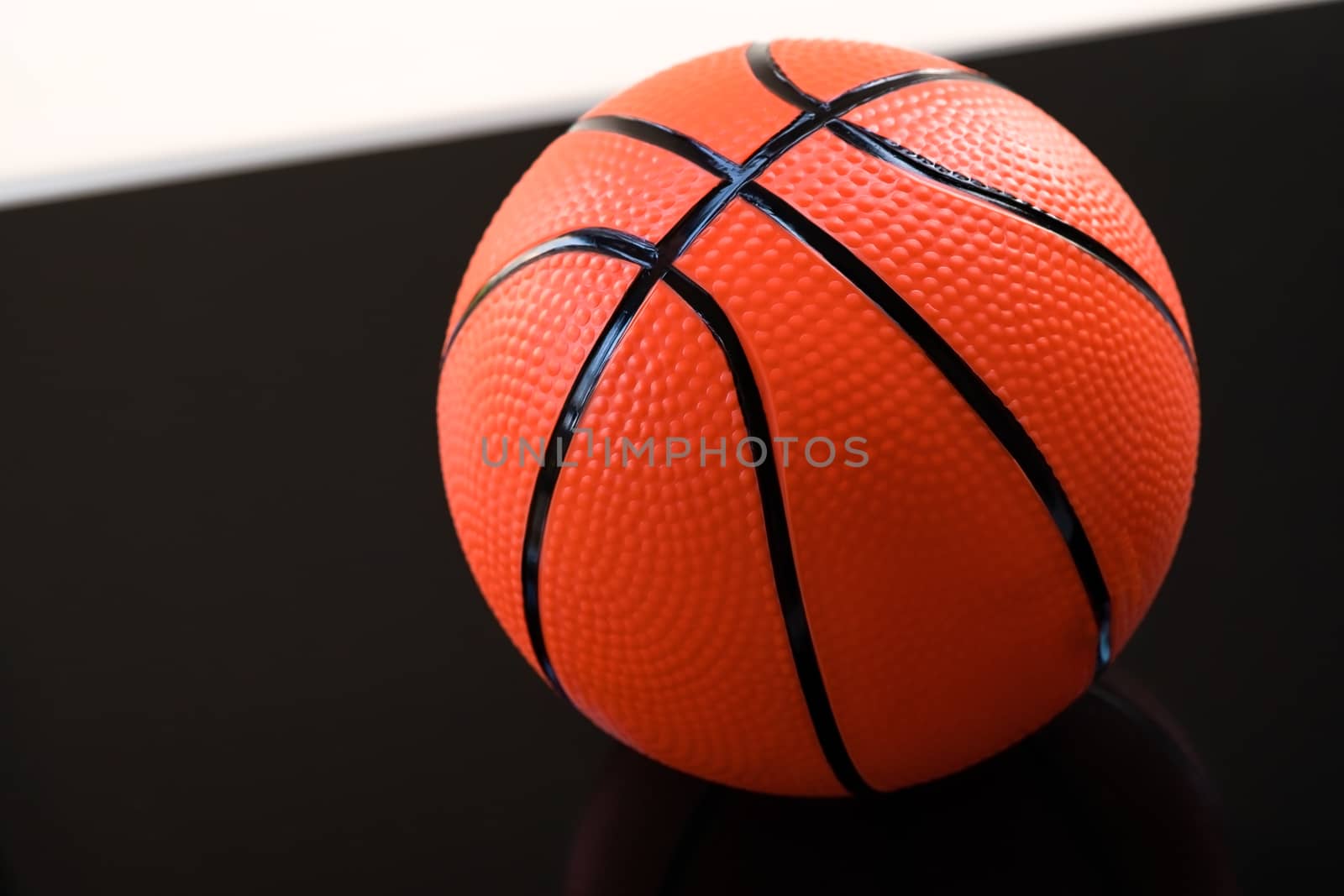 Basketball on a black and white background as a sports and fitness activity