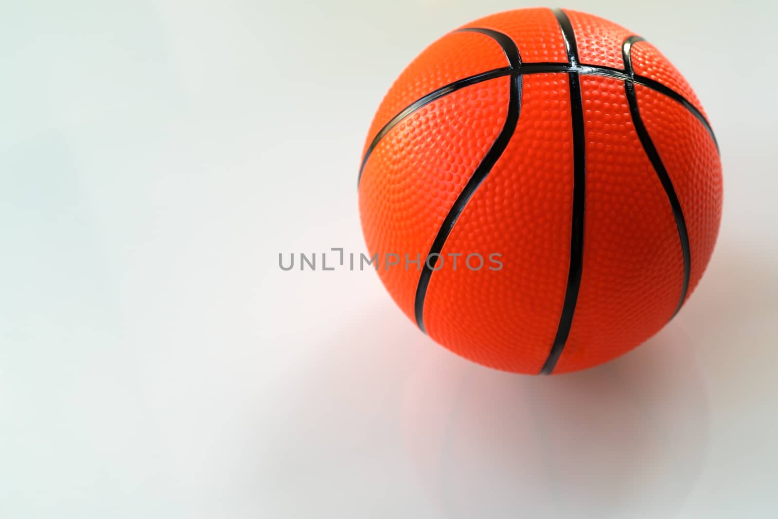 Basketball on white background as a sports and fitness activity