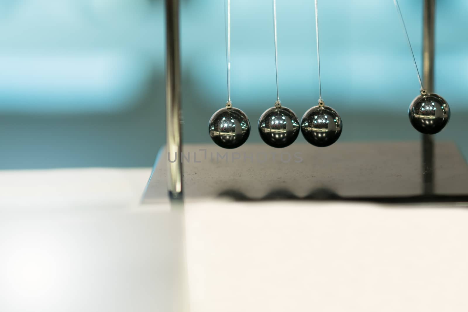 Balancing Balls Newton's Cradle on blurred backgrounds by psodaz