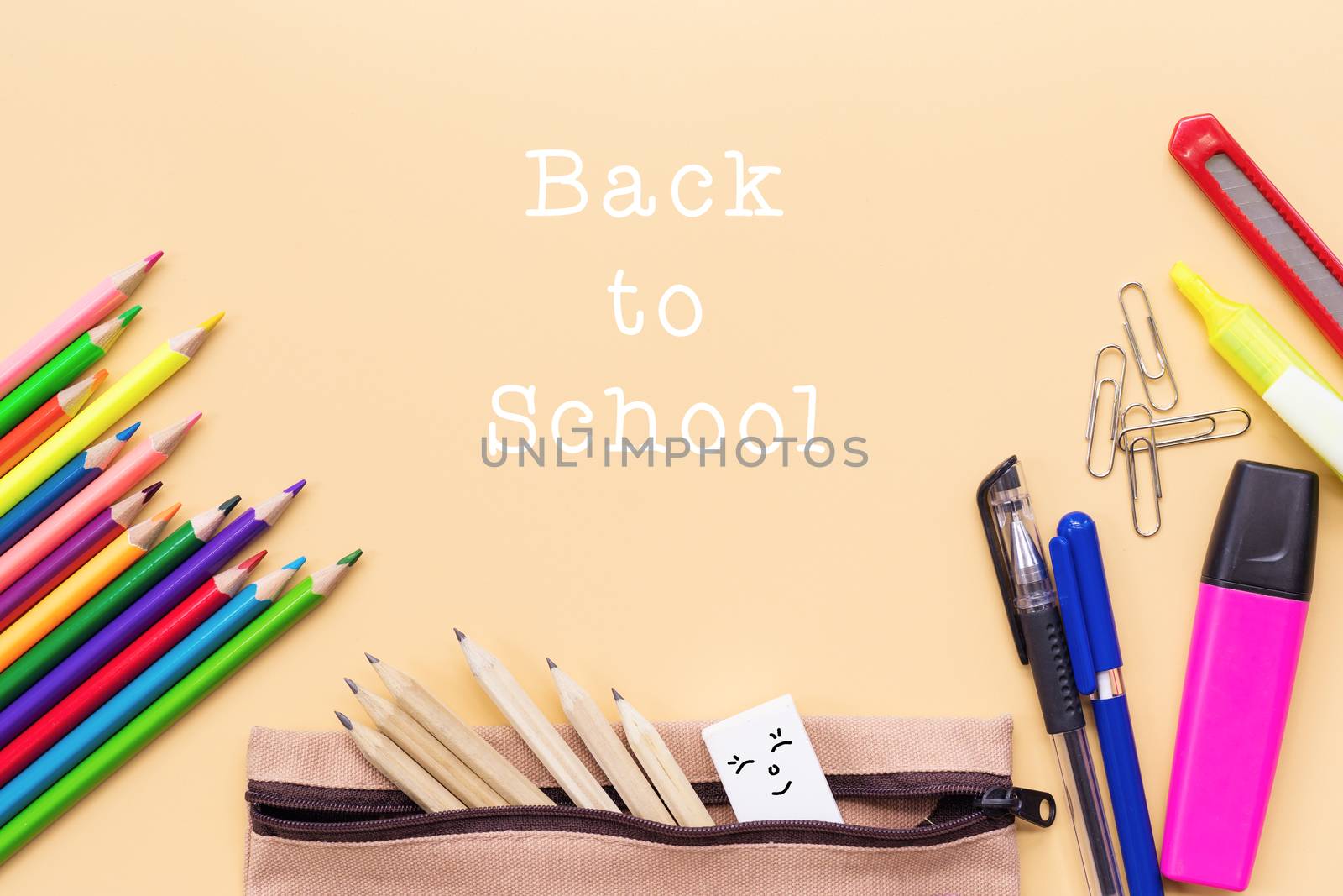 Welcome back to school background, colorful color pencil and stationery bag on yellow backgrounds with copy space