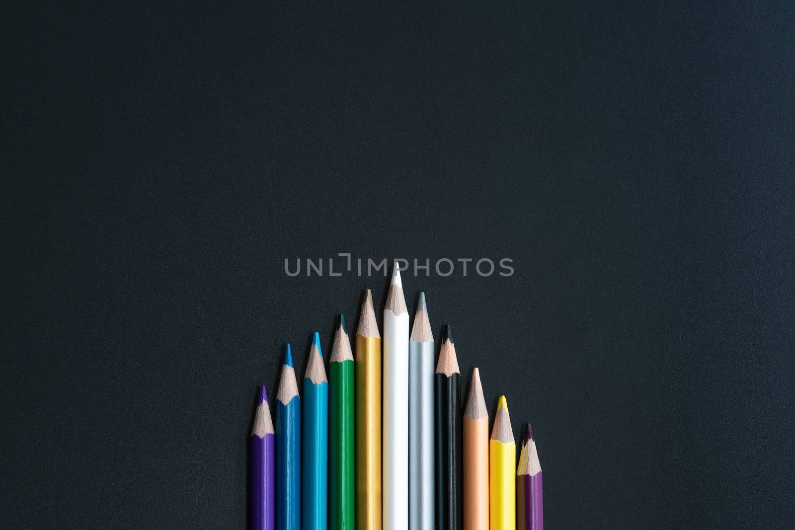 white color pencil lead other share idea on black background with copy space