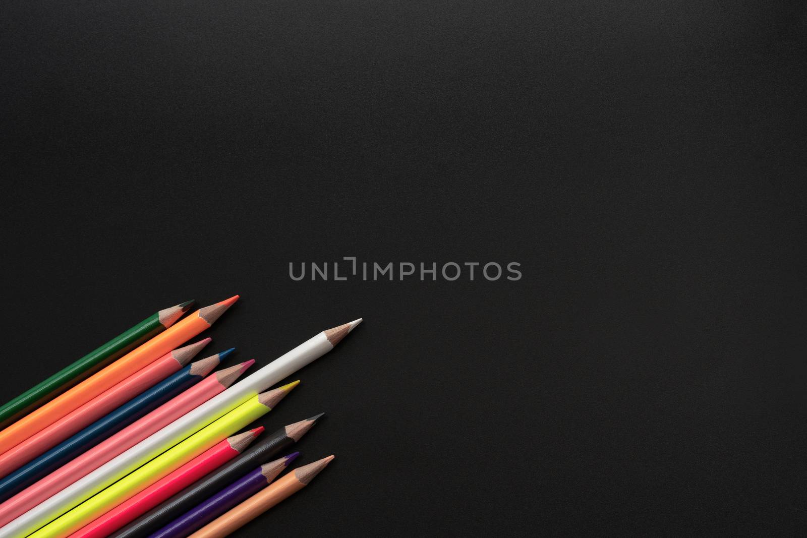 white color pencil lead other share idea on black background with copy space