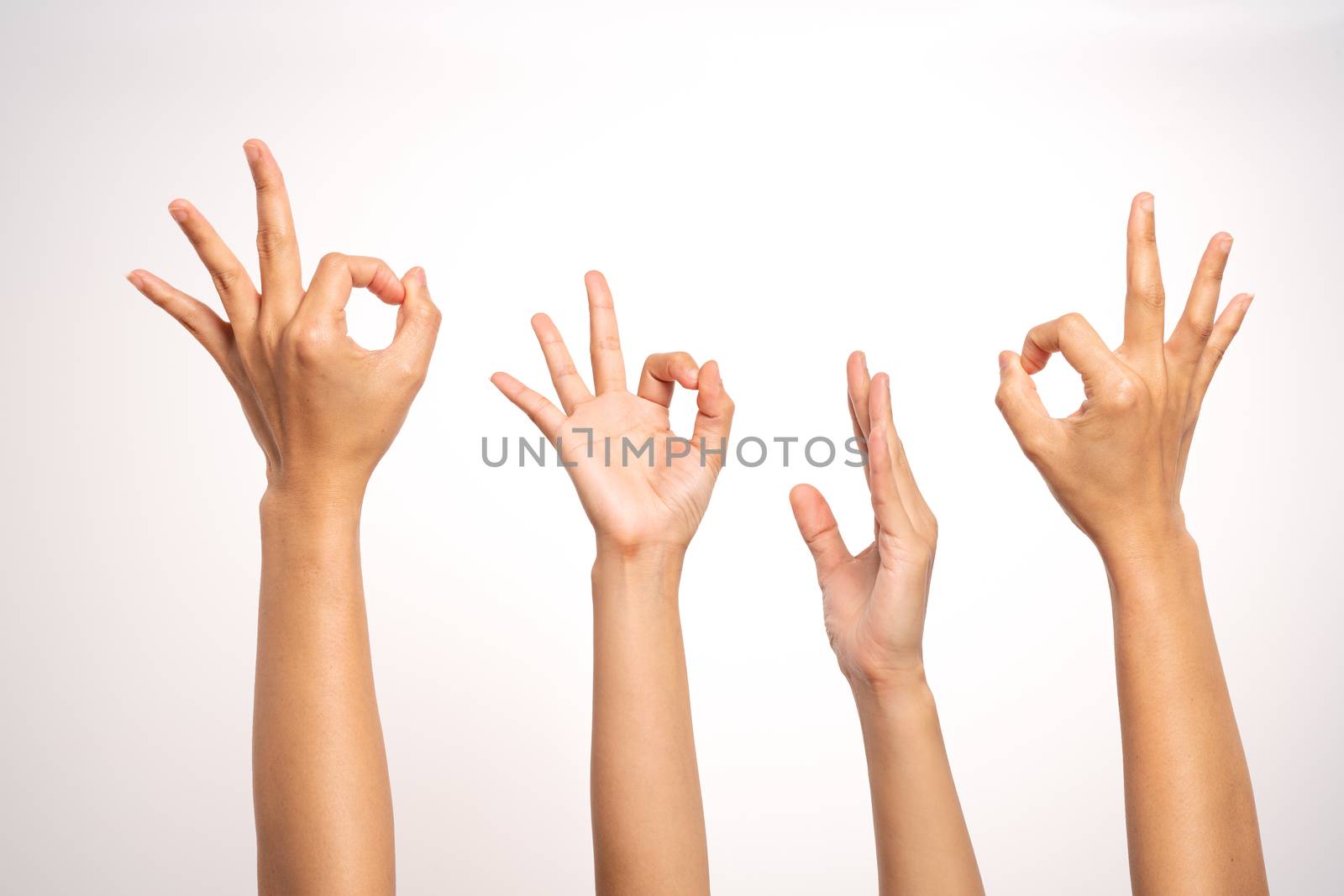 women hand OK sign and raise hand up gesturing on white background in four action