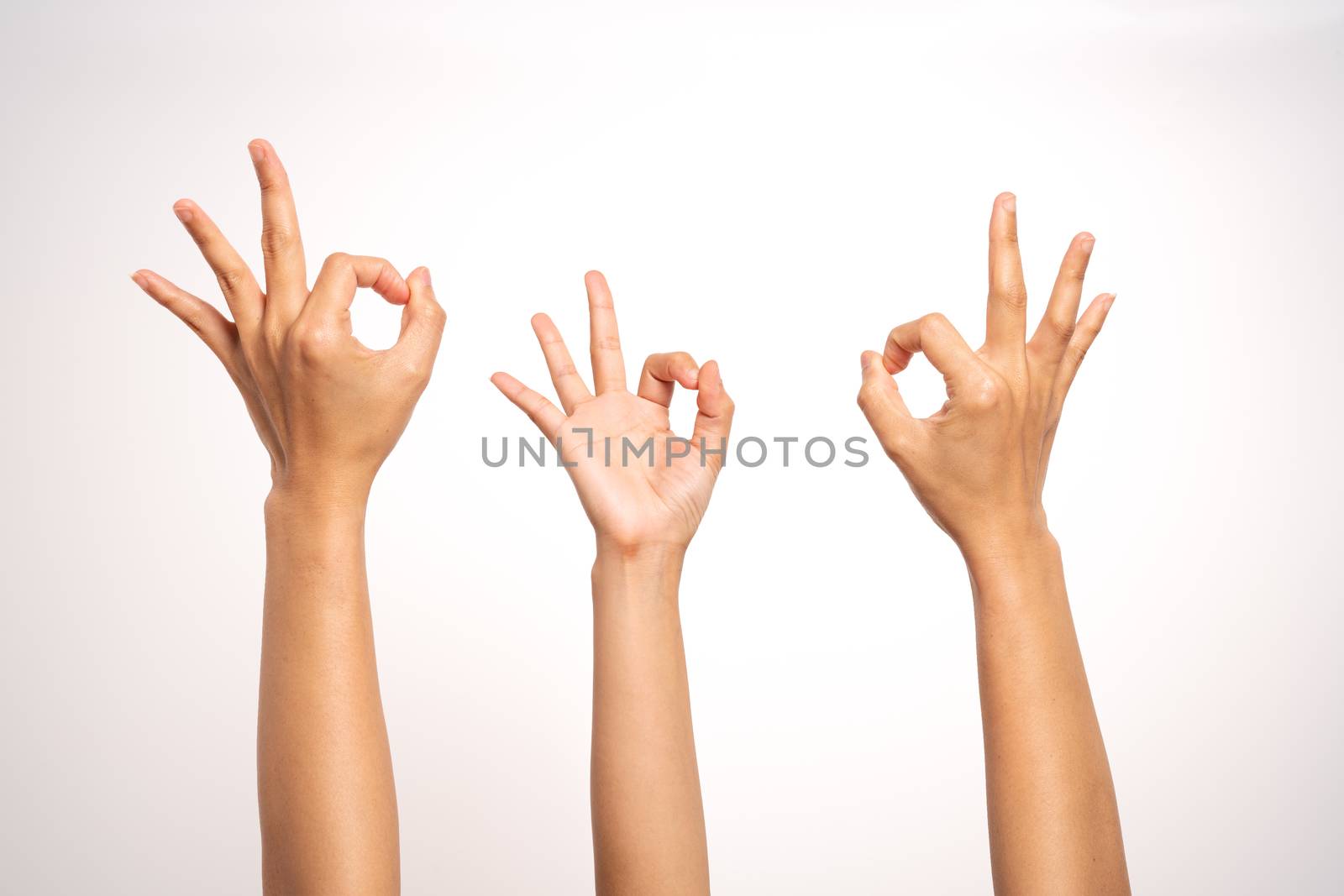 women hand OK sign gesturing on white background in three action