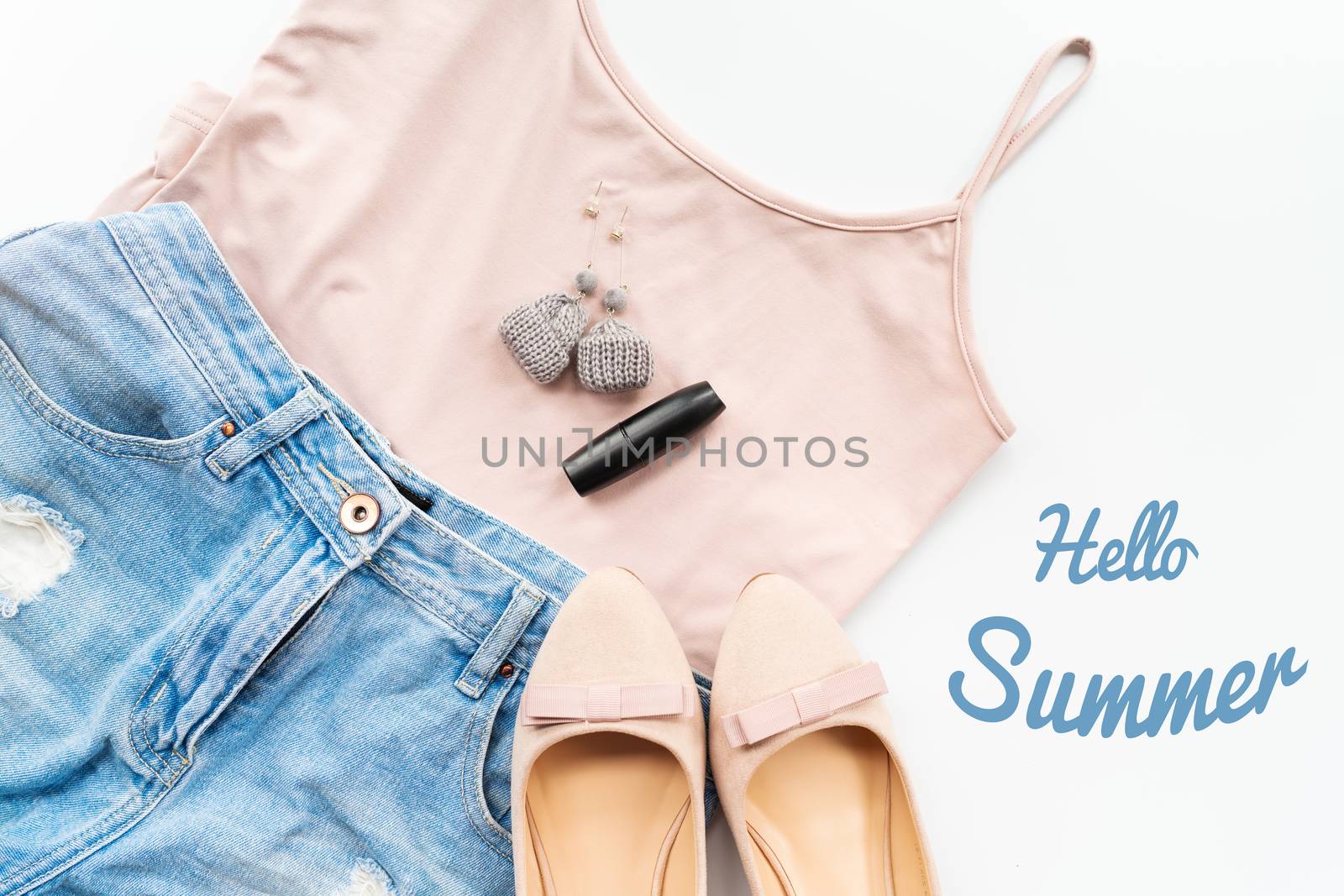 Hello summer concept. Female clothes, and accessories layout on white background. Flat lay. Top View