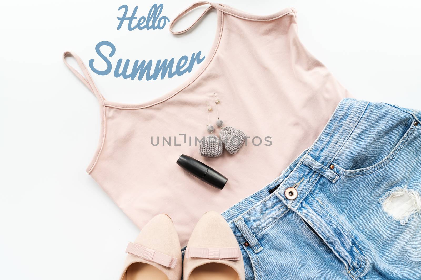 Hello summer concept. Female clothes, and accessories layout on white background. Flat lay. Top View