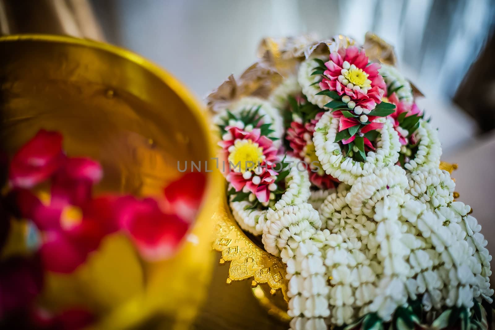 Flower garland for bride and groom in  Thai wedding by psodaz