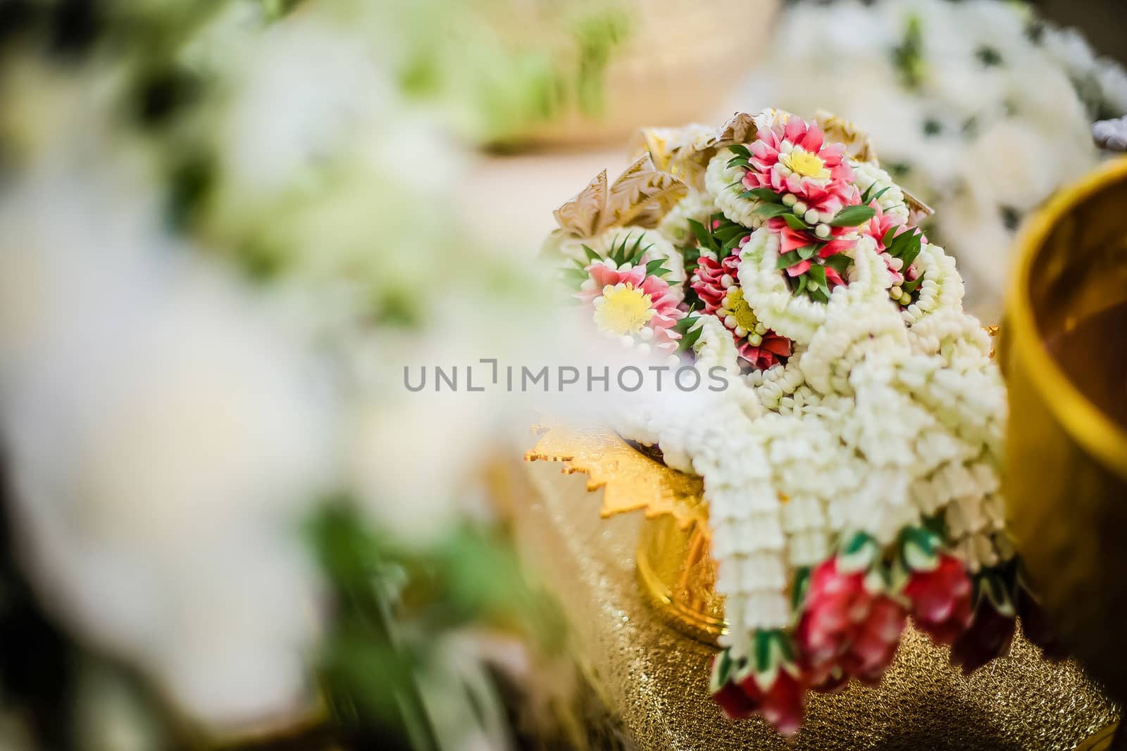 Flower garland for bride and groom in Thai wedding by psodaz