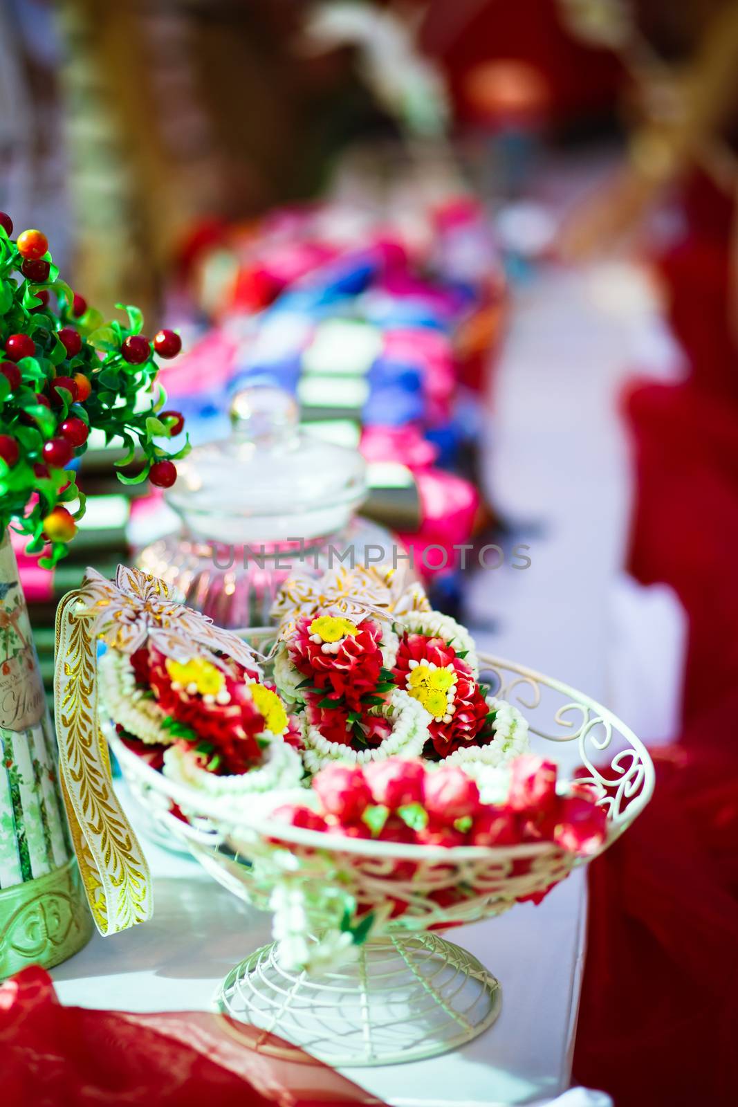 Flower garland for bride and groom in Thai wedding by psodaz