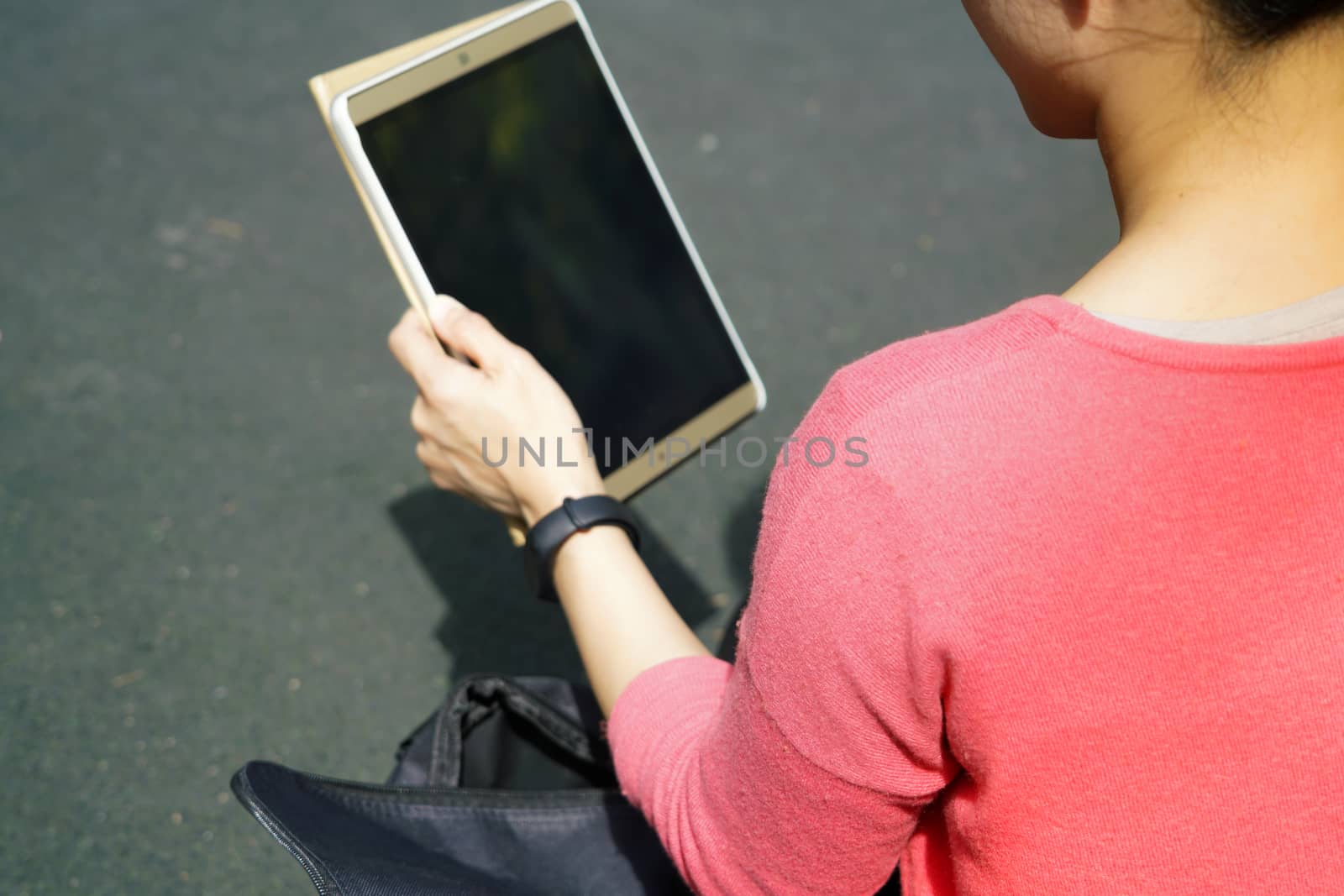 Young student women looking at the tablet computer