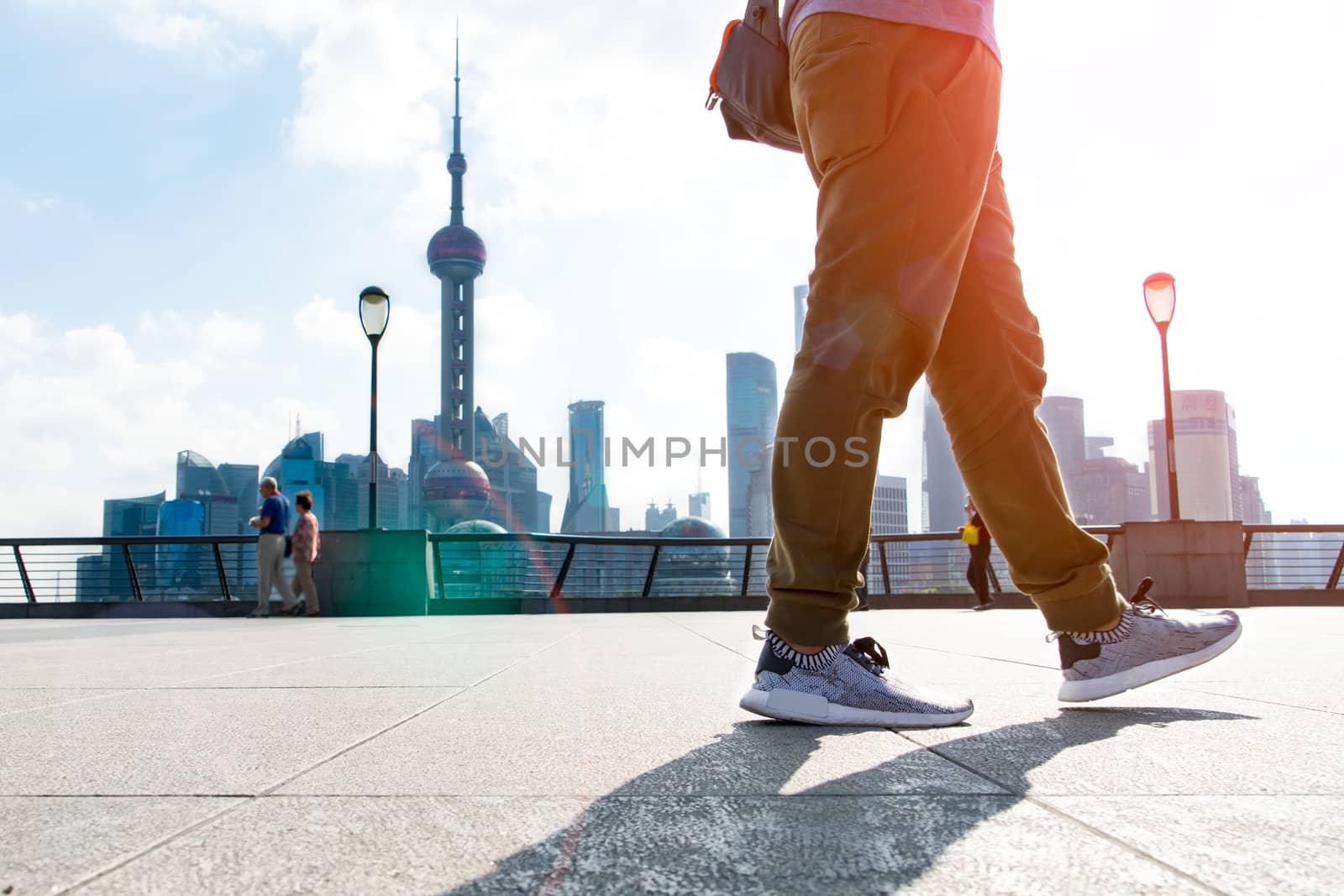 SHANGHAI CHINA OCT,2017: walking man in the summer at bund Shanghai city view background