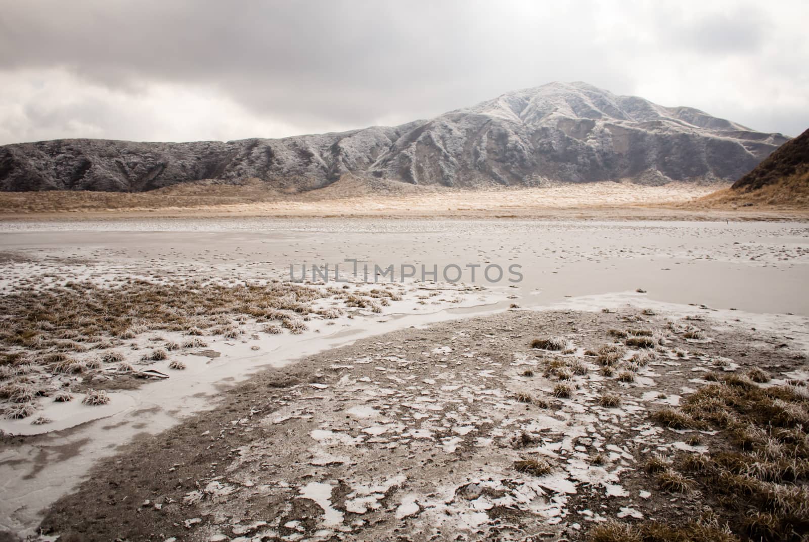 Mount Aso and Kusasenri in winter. covered by golden yellow grassland - Kumamoto, Japan