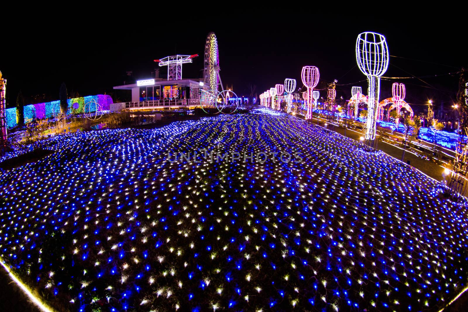 NAGASAKI, JAPAN - April 29, 2019 : Huis Ten Bosch is a theme park in Nagasaki, Japan, which displays old Dutch buildings and colorful lights show at night.