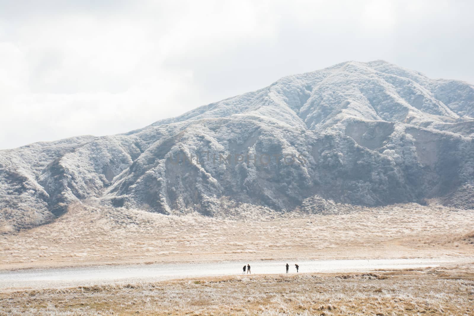 Mount Aso and Kusasenri in winter. covered by golden yellow grassland - Kumamoto, Japan