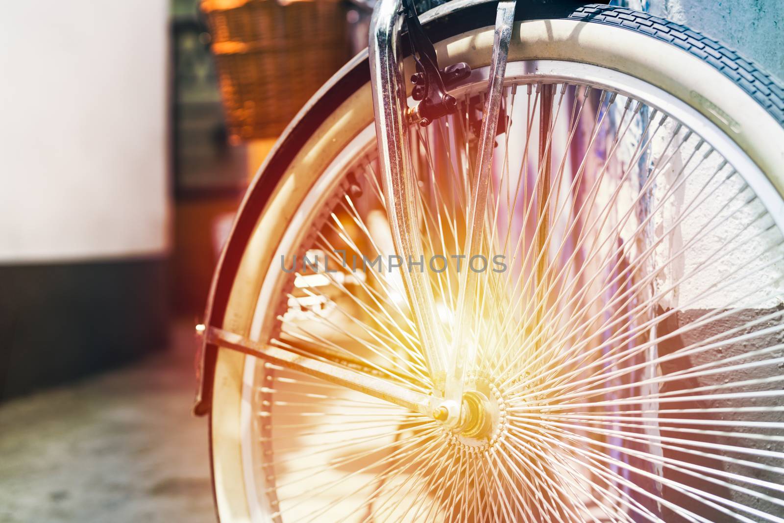 Vintage bicycle parking lean on the house wall. Summer vintage concept