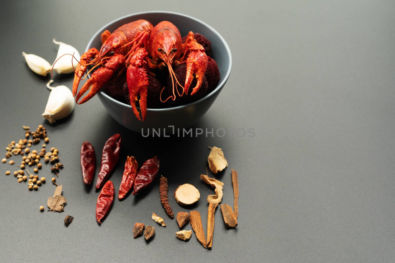 Crayfish red, Baby Lobster with herb for stir fry on black background