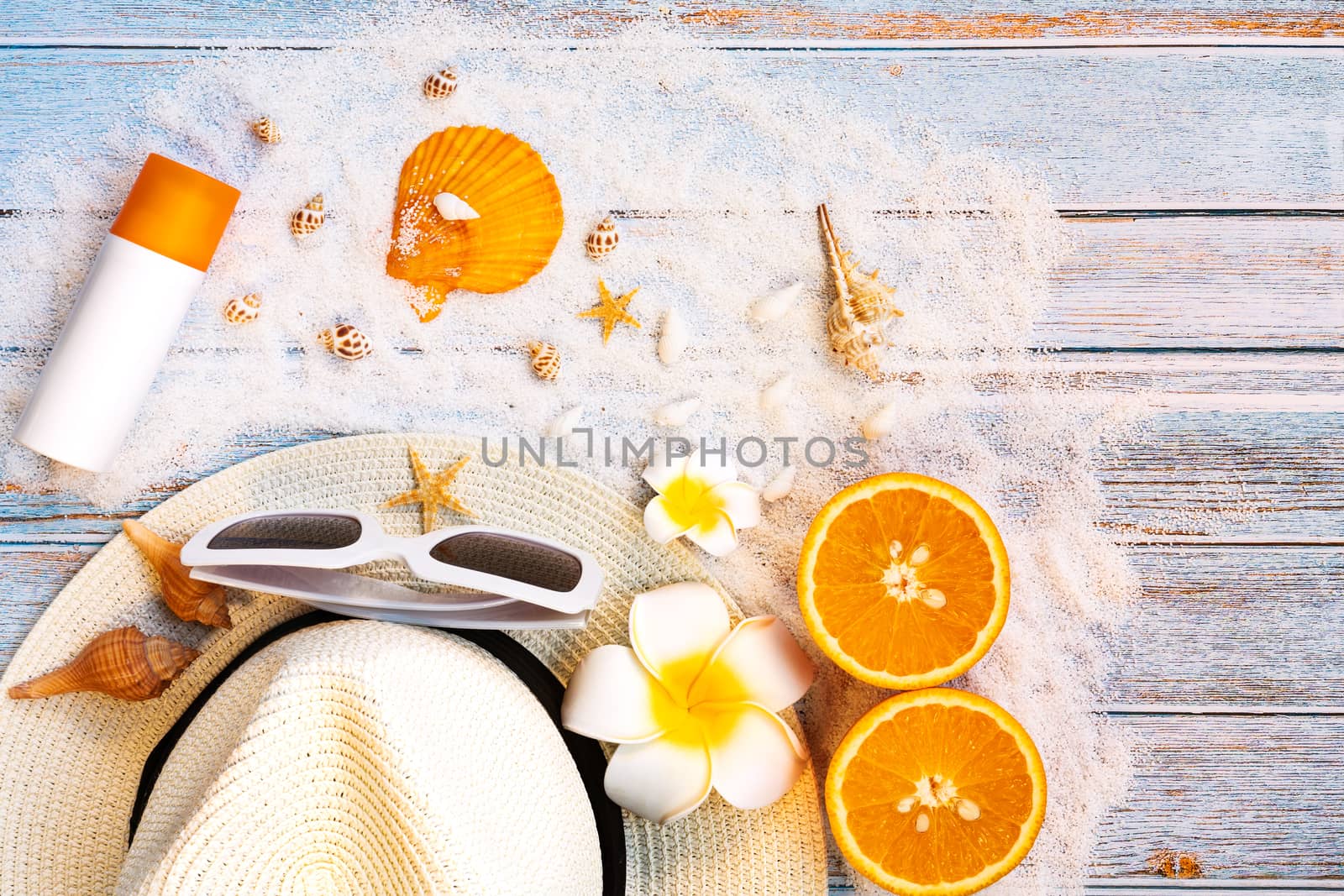Beautiful summer holiday, Beach accessories, sunglasses, hat and shells on wooden backgrounds