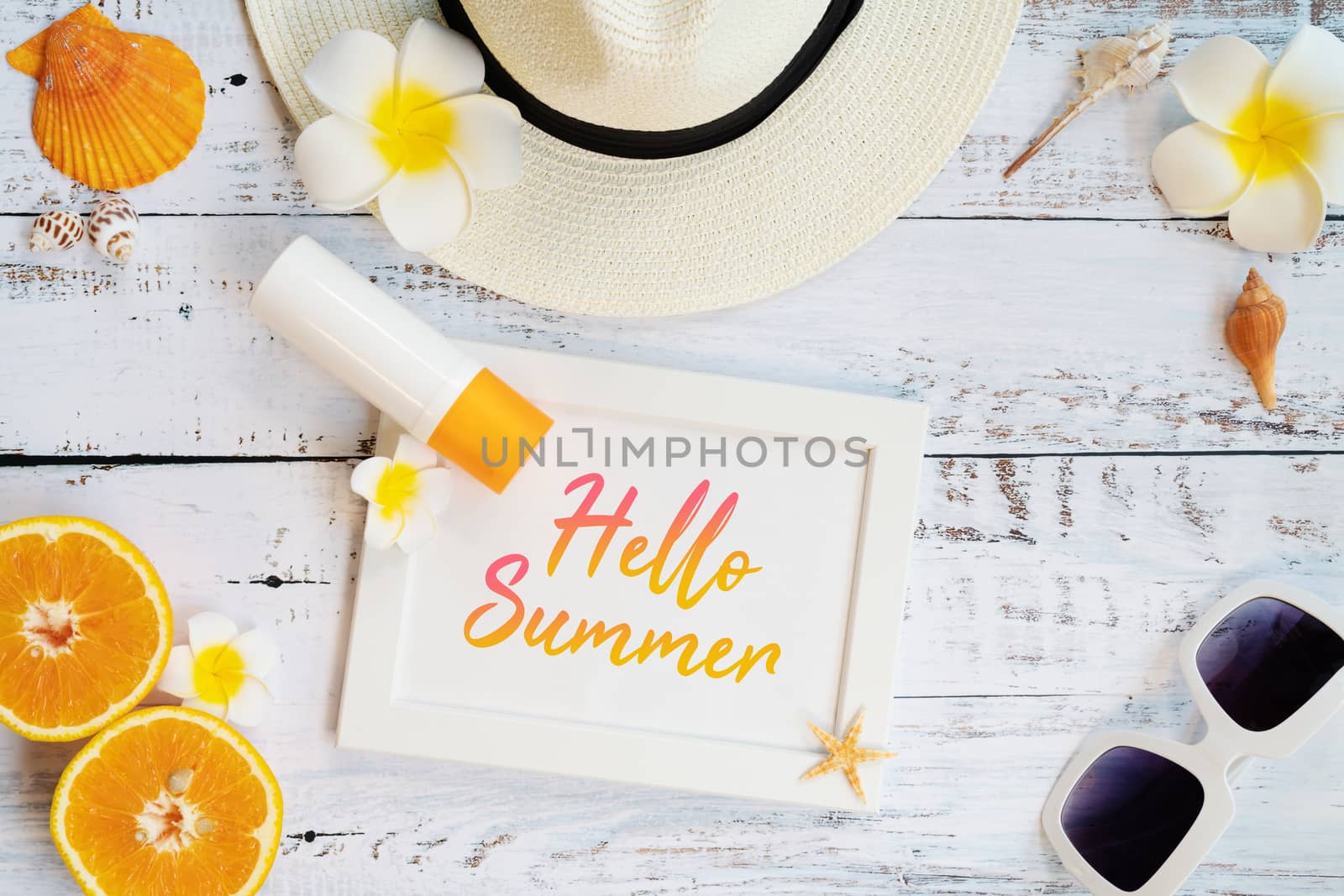 Beautiful summer holiday, Beach accessories, ornage, sunglasses, hat and shells on wooden backgrounds