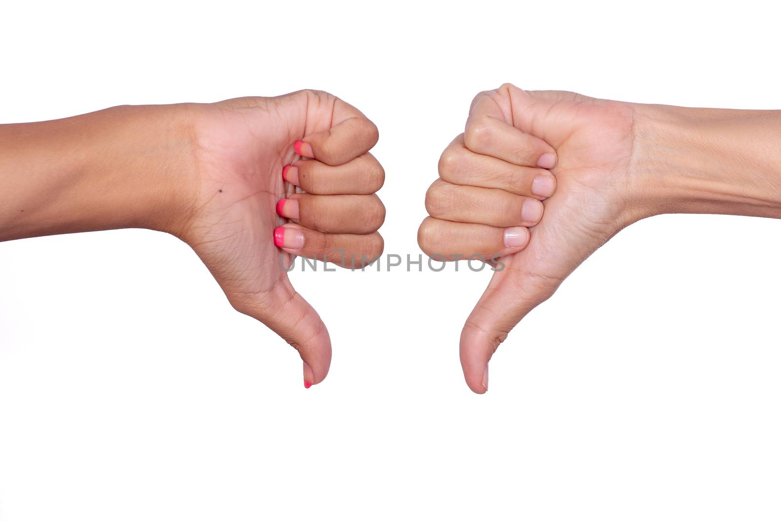 Female hands making signals with the thumb down
