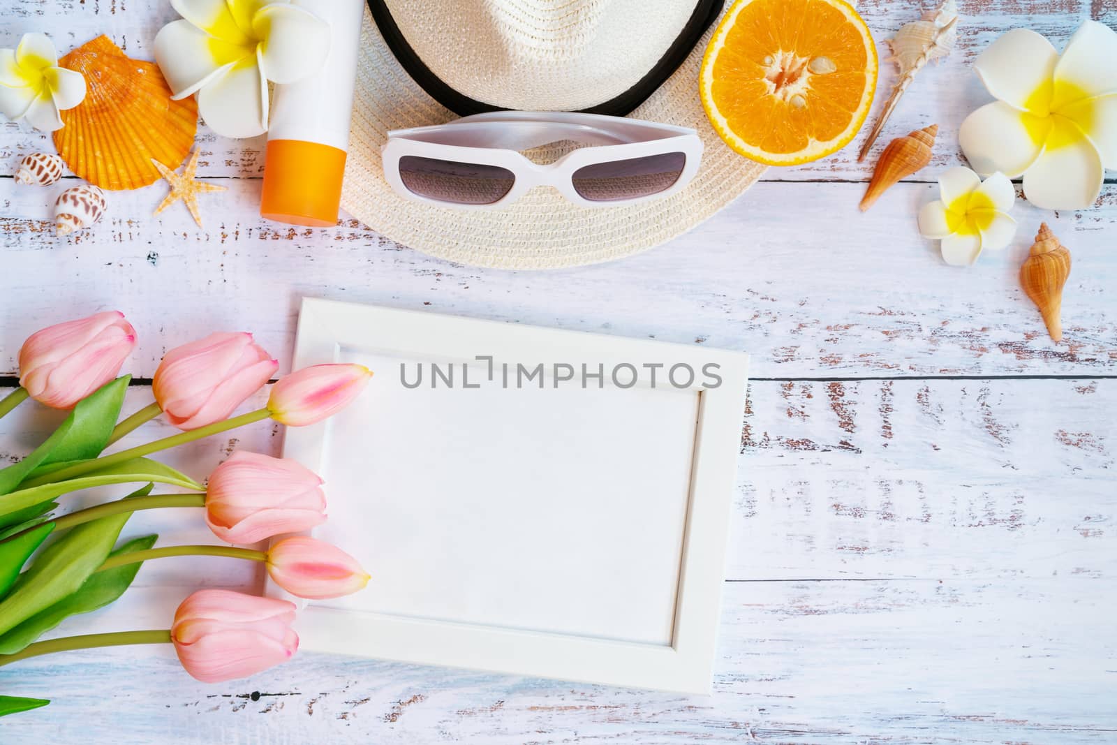 Beautiful summer holiday, Beach accessories, orange, sunglasses, hat and shells on wooden backgrounds