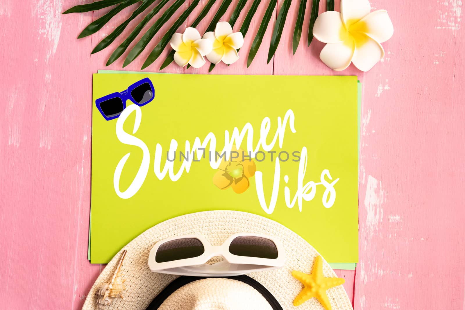 Beautiful summer holiday, Beach accessories, sea shells, hat, sunglasses and palm leave on paper for copy space