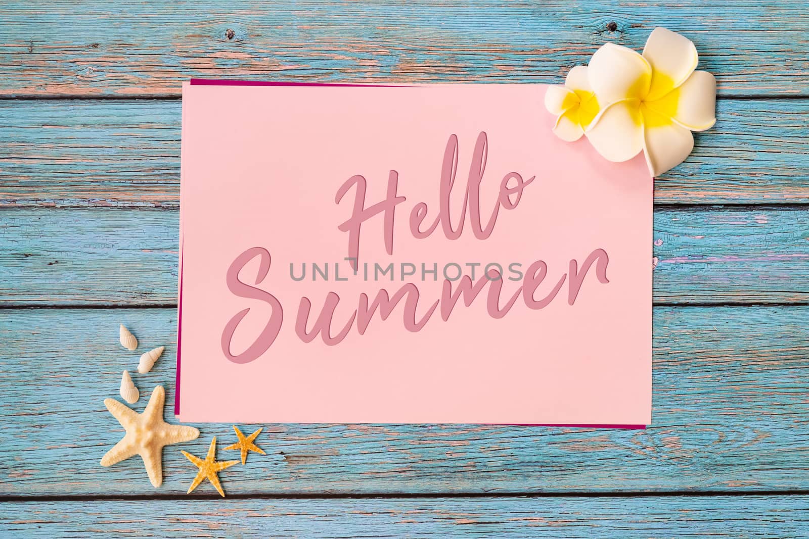Beautiful summer holiday, Beach accessories, seashells and flower on paper for copy space