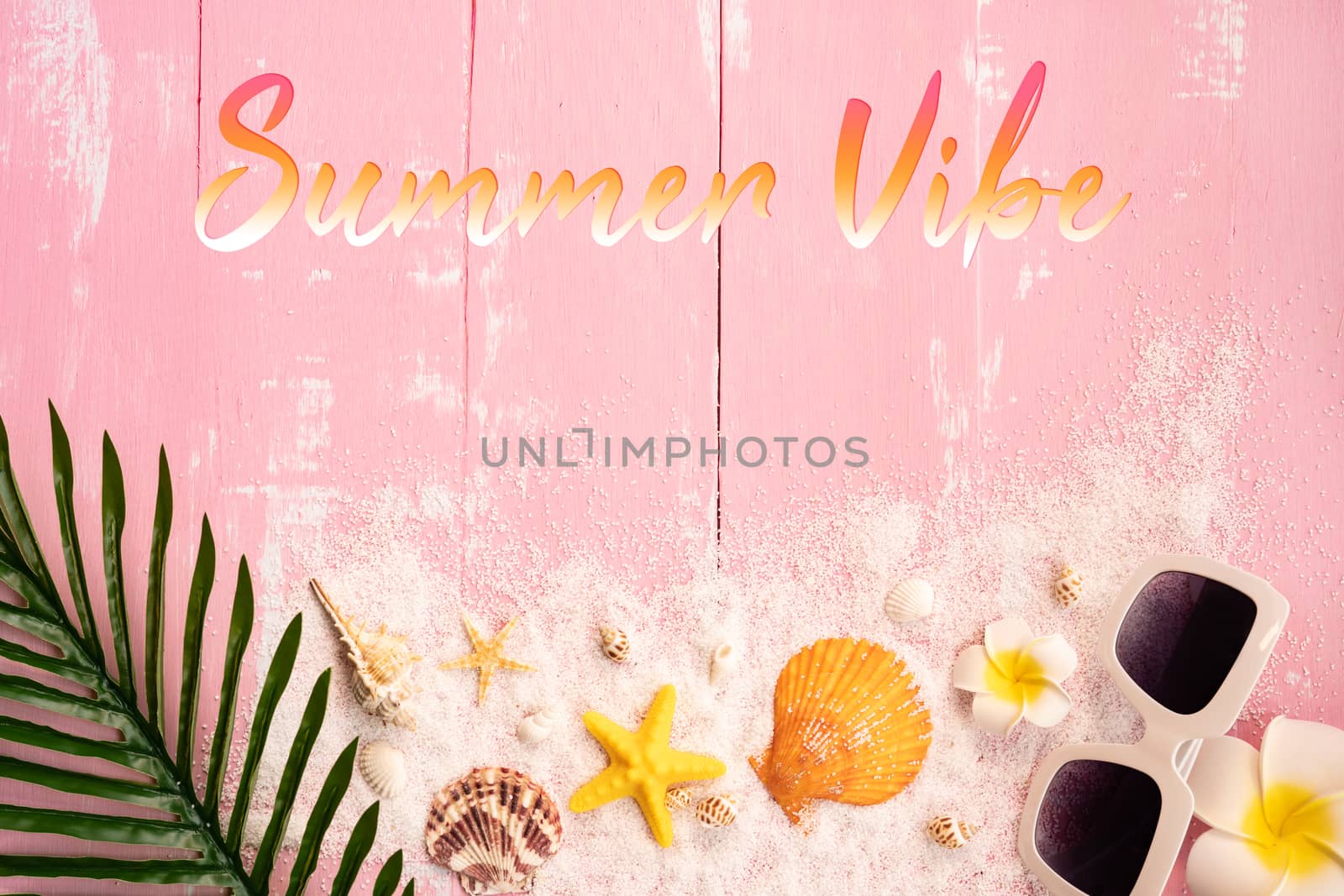Beautiful summer holiday, Beach accessories, seashells, sand, sunglasses and palm leave on wooden backgrounds
