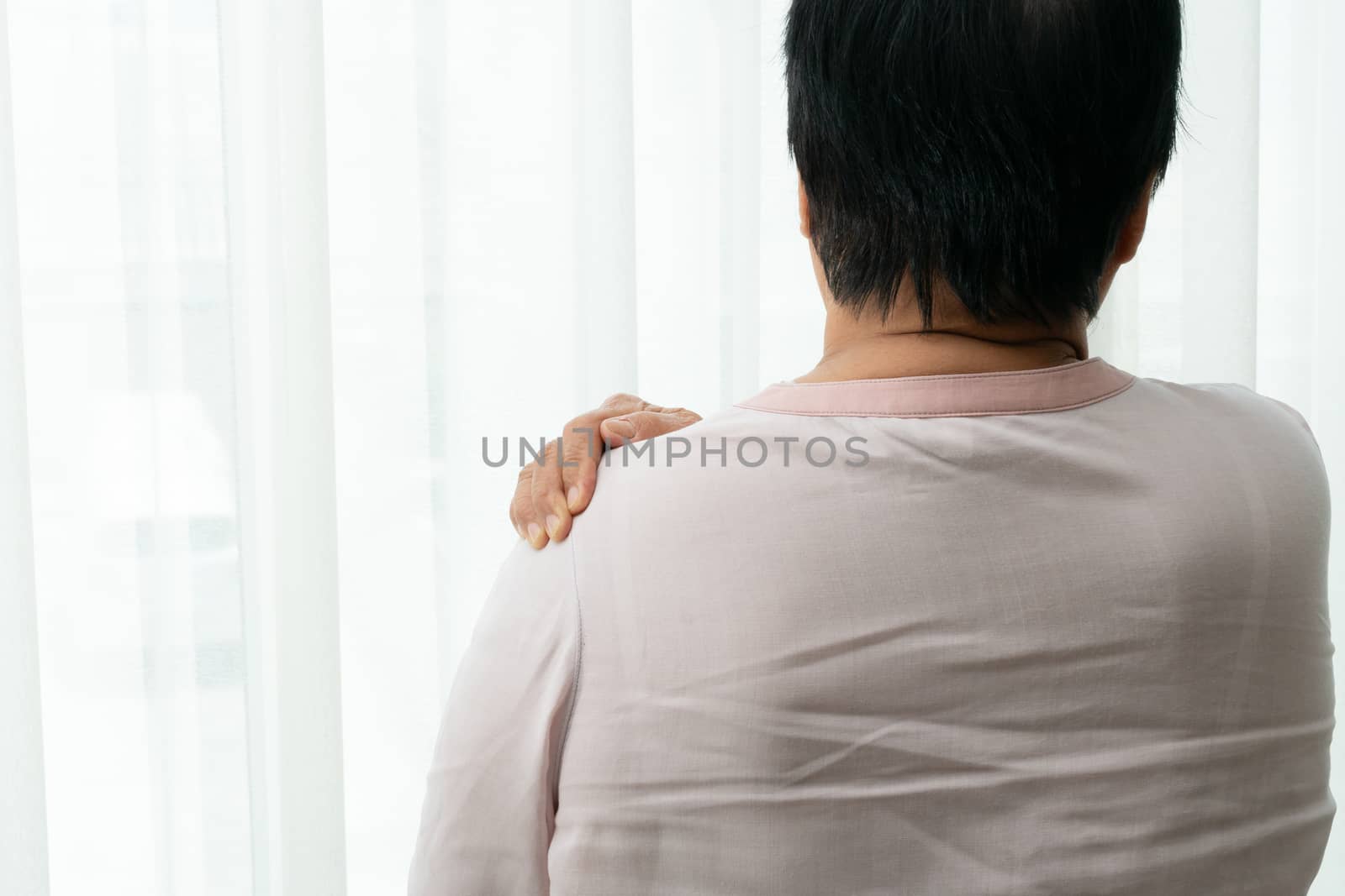 neck and shoulder pain, old woman suffering from neck and shoulder injury, health problem concept