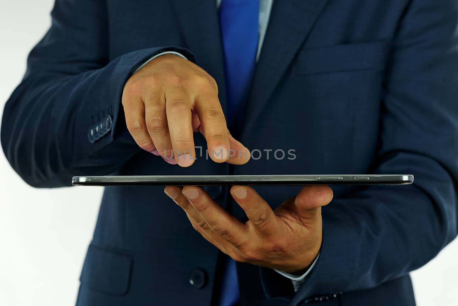 Businessman using digital tablet by wdnet_studio