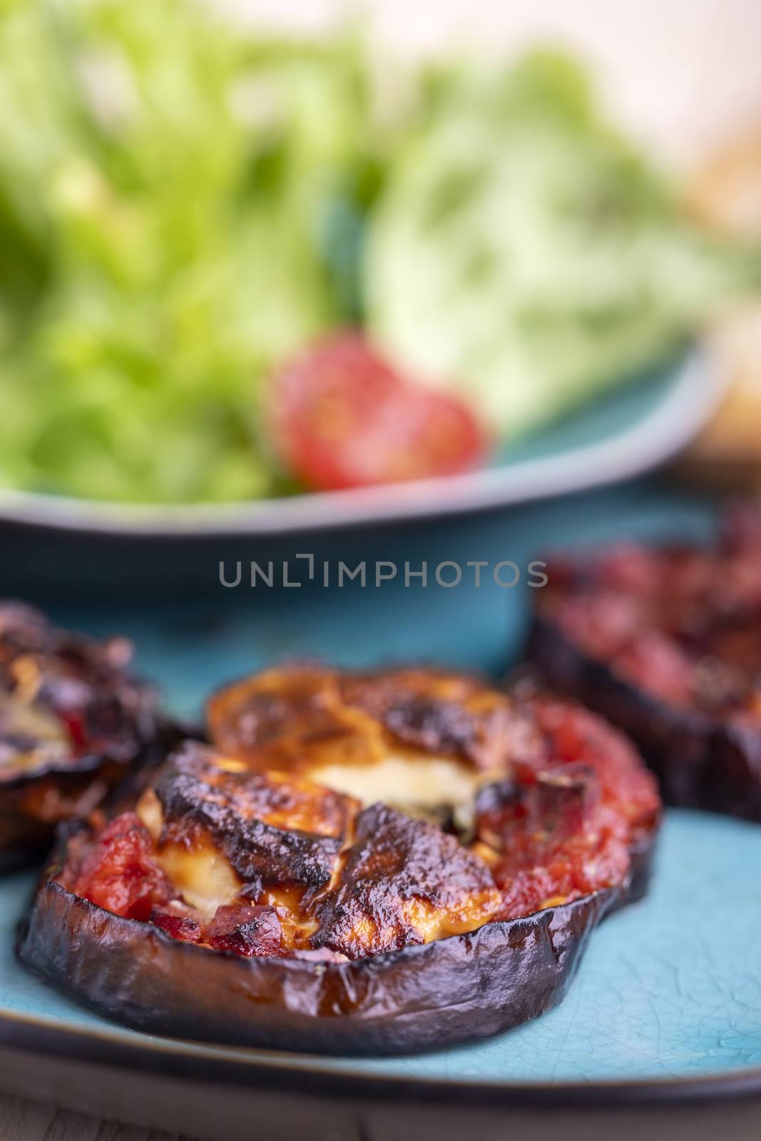 grilled eggplants with cheese and salad