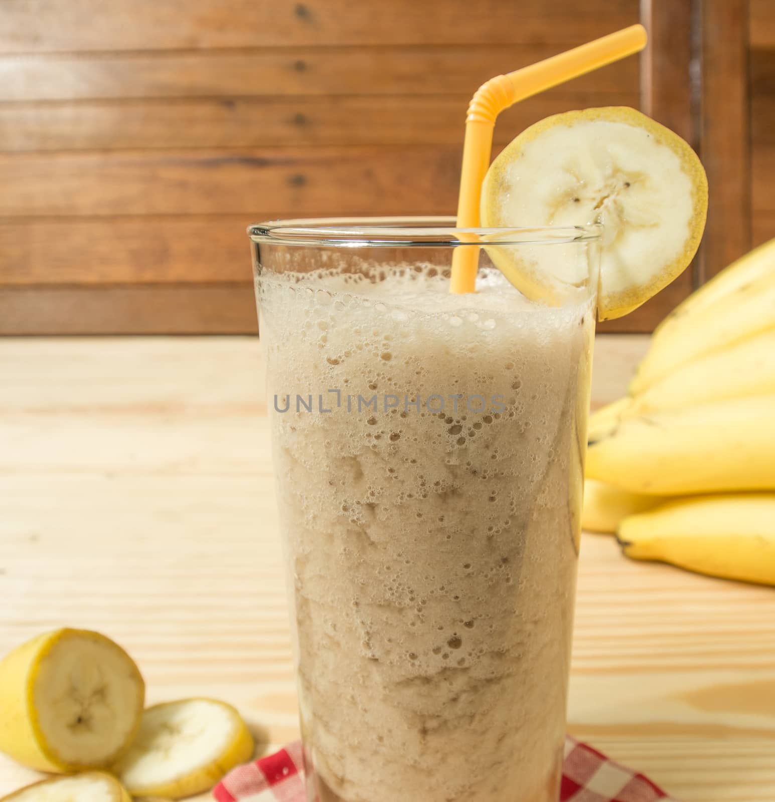 Banana juice on a wooden table