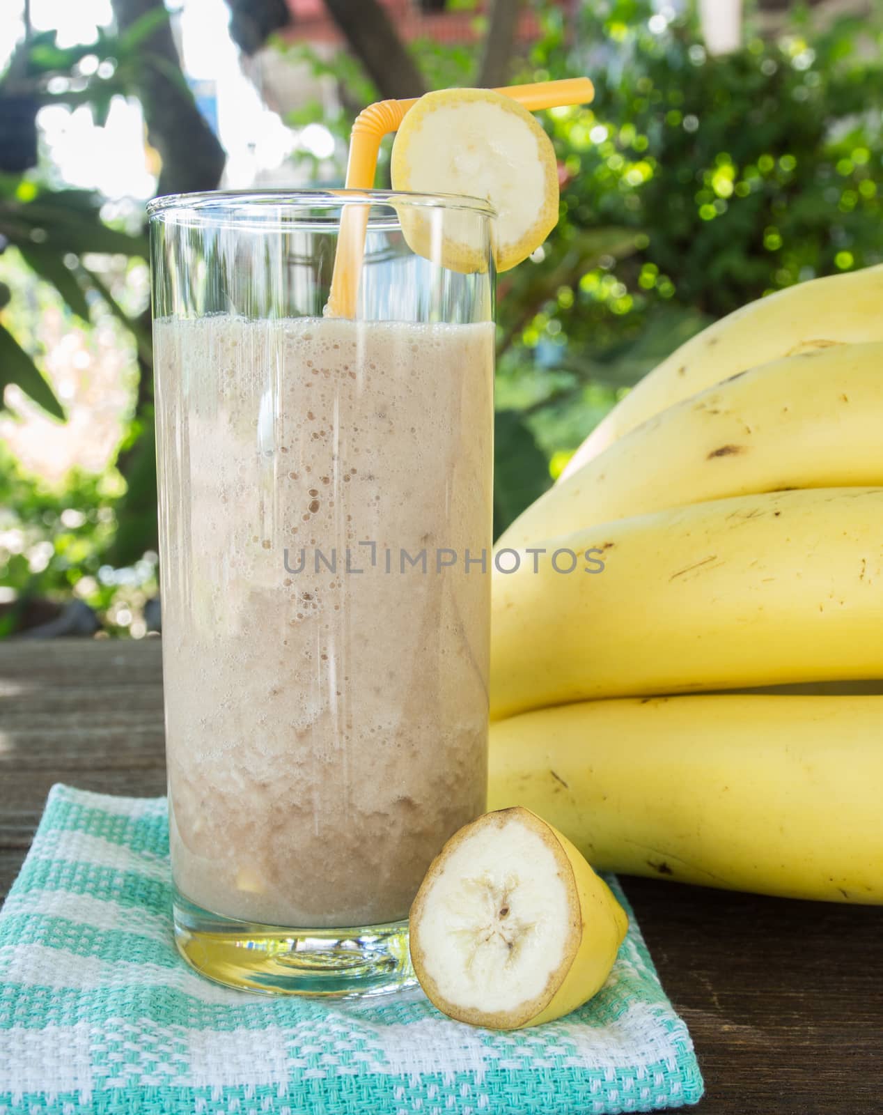 Banana juice on a wooden table