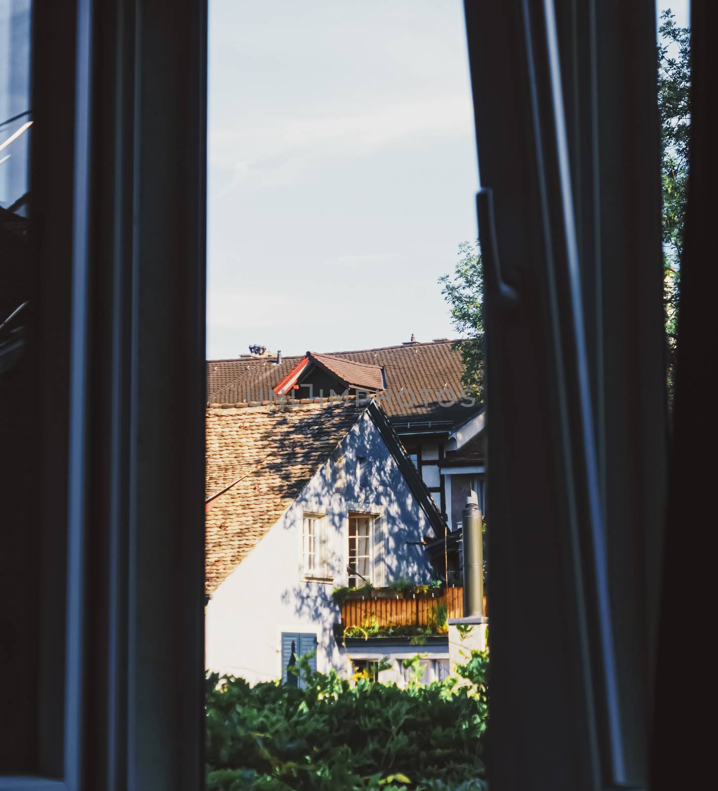 European architecture and daily life of city center street in Zurich, Switzerland by Anneleven