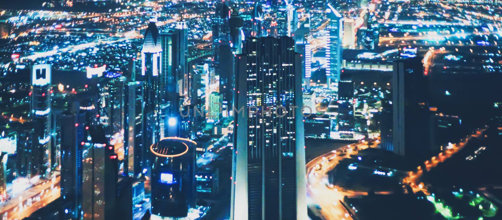 Aerial night view of Dubai in United Arab Emirates, metropolitan cityscape scenery