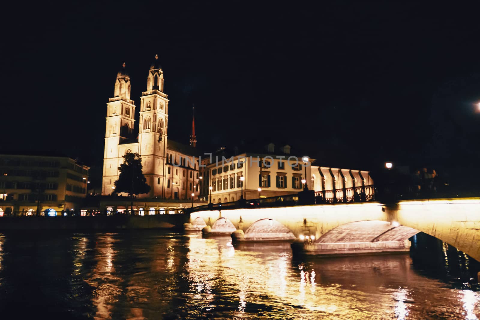 European architecture and night view of city center street in Zurich, Switzerland by Anneleven