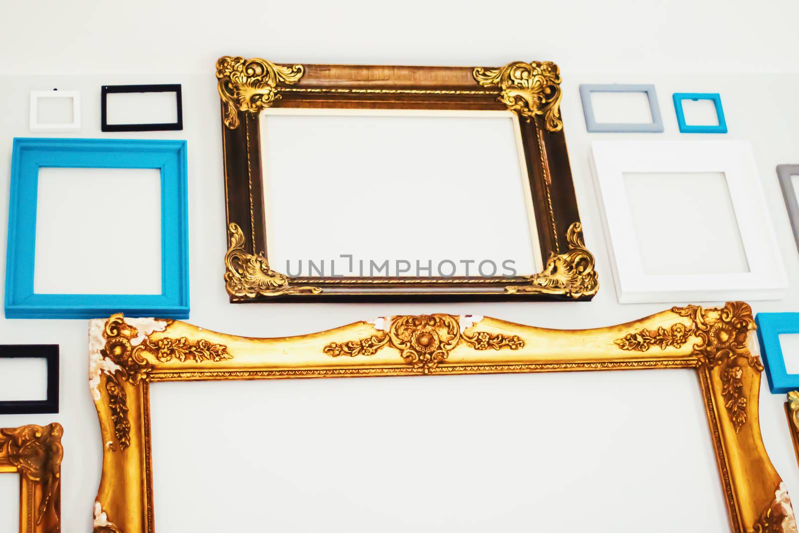 Empty art frames on gallery wall, decor and design by Anneleven