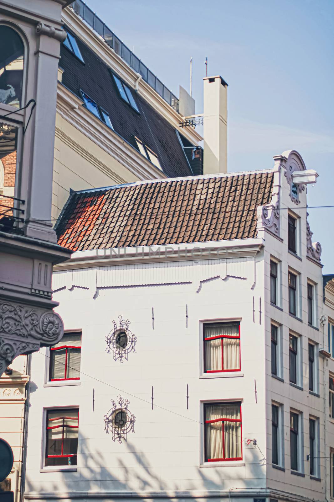 Main downtown street in the city center of Amsterdam in Netherlands by Anneleven