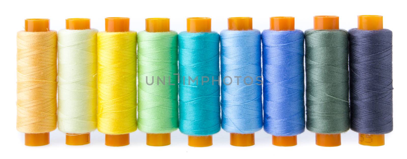 Sewing threads multicolored isolated on white  background