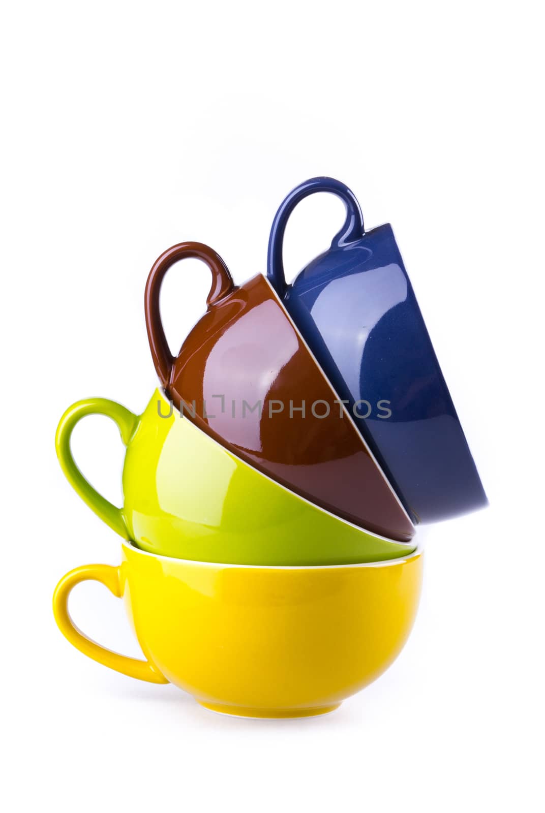colorful ceramic cup on white background