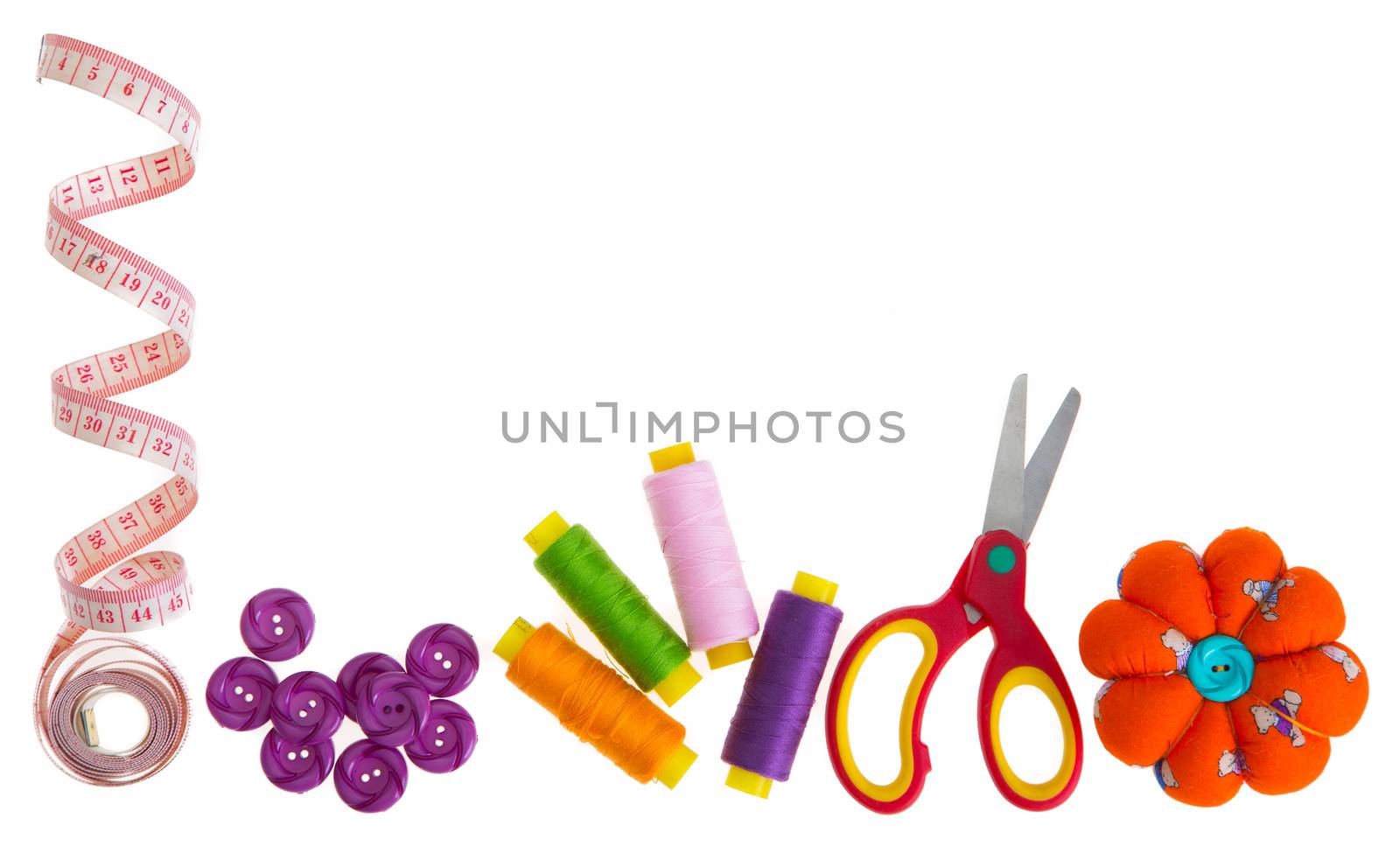 Sewing accessories isolated on white background