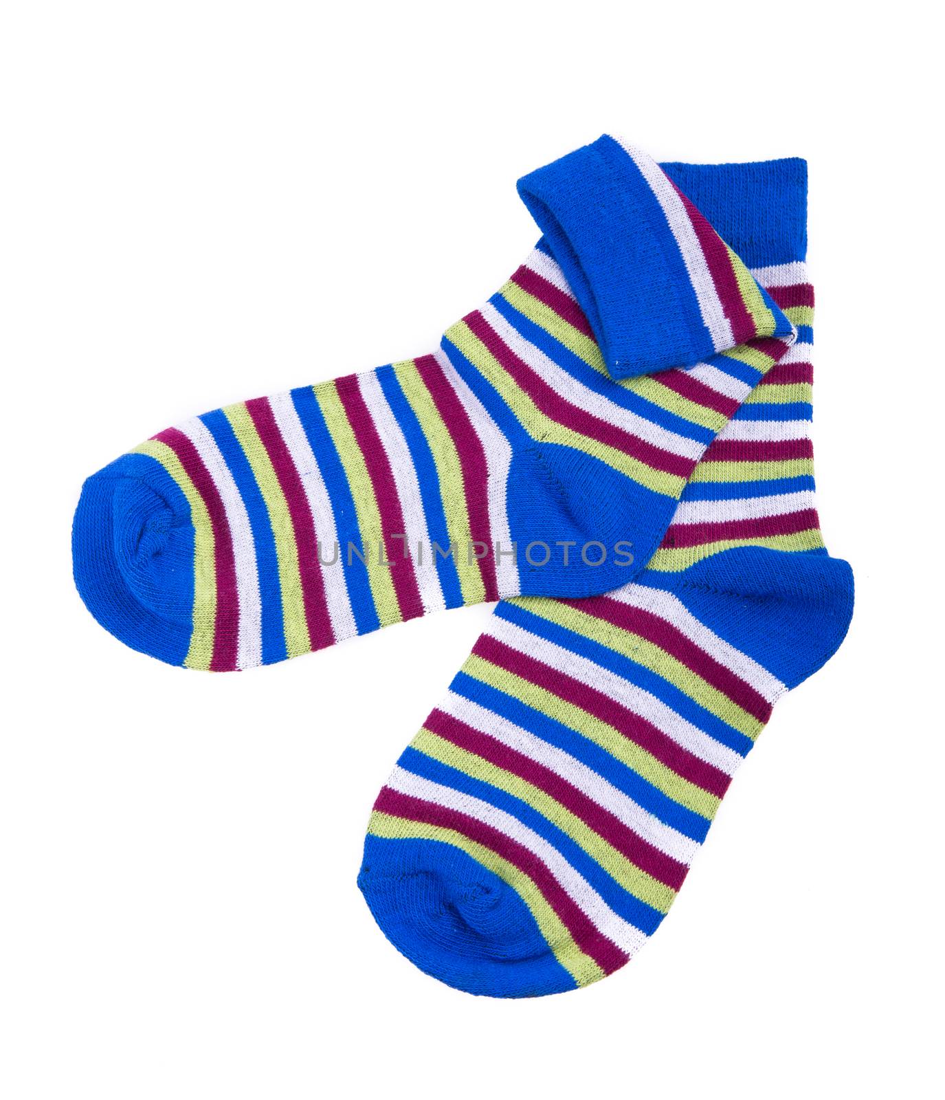 Multicolor child's striped socks isolated on white background