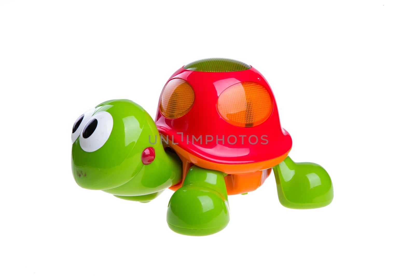 children's toy green turtle isolated on white background