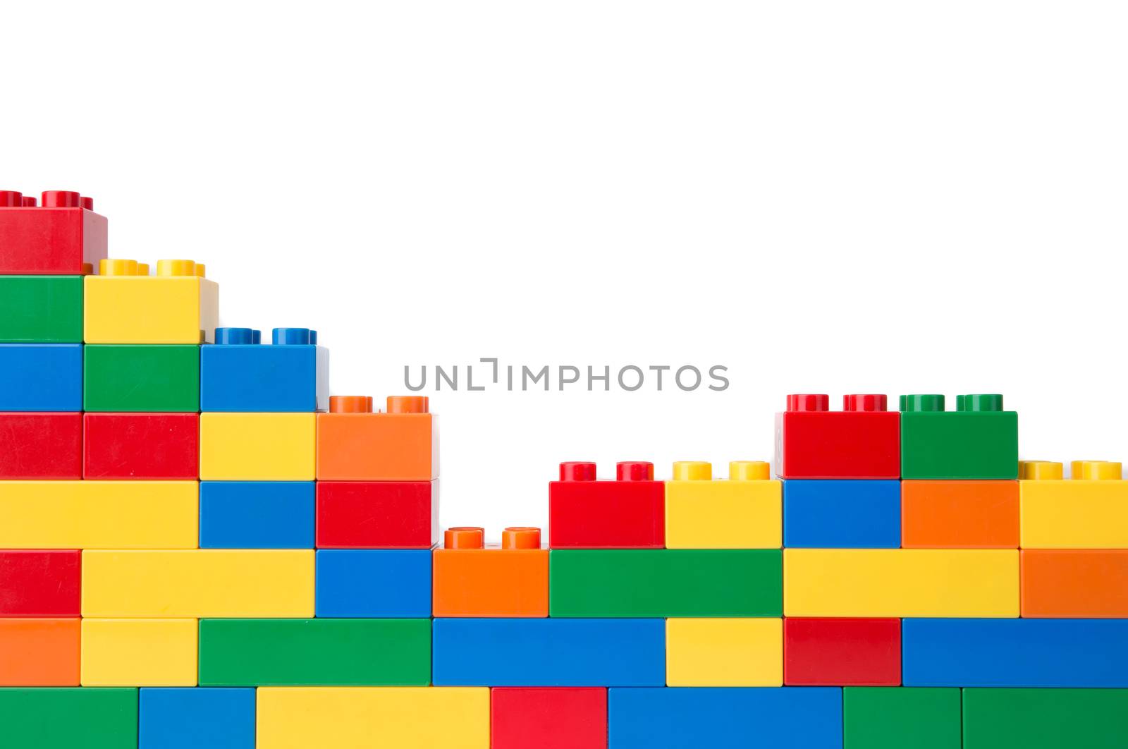 Plastic building blocks isolated on white background