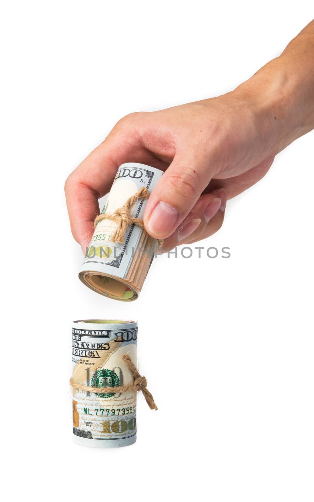 hand stacking an usd isolated on white background